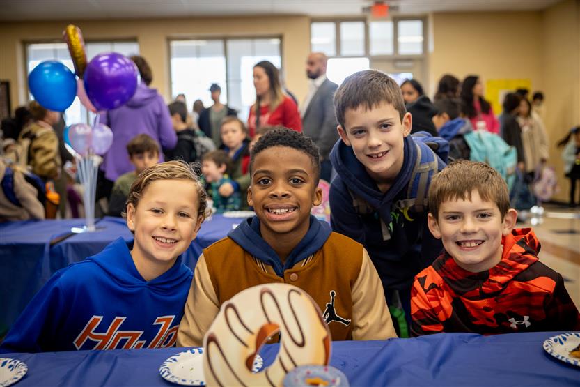 Students enjoy pastries with their parents
